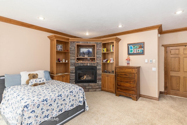 1255 Lost Crk, Thayne, WY 83127 - bedroom with crown molding, light colored carpet, a fireplace, recessed lighting, and baseboards