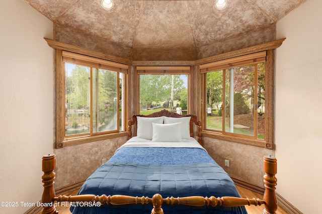 1255 Lost Crk, Thayne, WY 83127 - bedroom with wood finished floors and baseboards