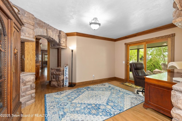 1255 Lost Crk, Thayne, WY 83127 - office space with ornamental molding, arched walkways, wood finished floors, and ornate columns