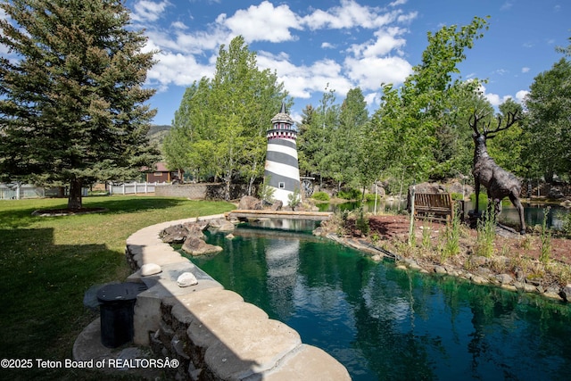 1255 Lost Crk, Thayne, WY 83127 - view of pool with a lawn