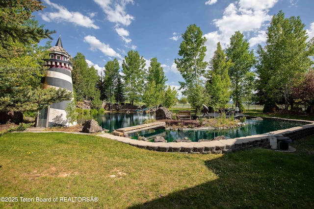 1255 Lost Crk, Thayne, WY 83127 - view of pool featuring a yard