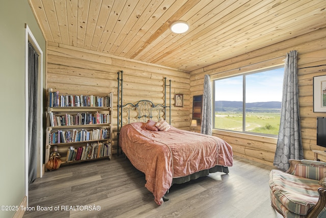 105 Elk Path, Swan Valley, ID 83428 - bedroom featuring rustic walls, wood finished floors, and wooden ceiling