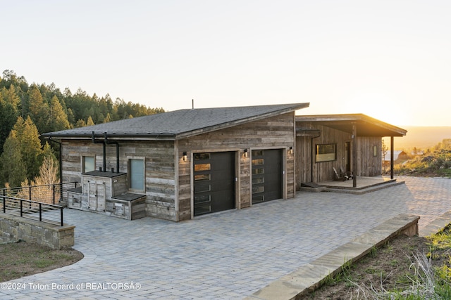 5170 Meandering Moose Dr, Victor, ID 83455 - view of front of home featuring decorative driveway