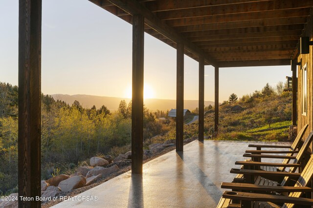 5170 Meandering Moose Dr, Victor, ID 83455 - patio terrace at dusk featuring a patio
