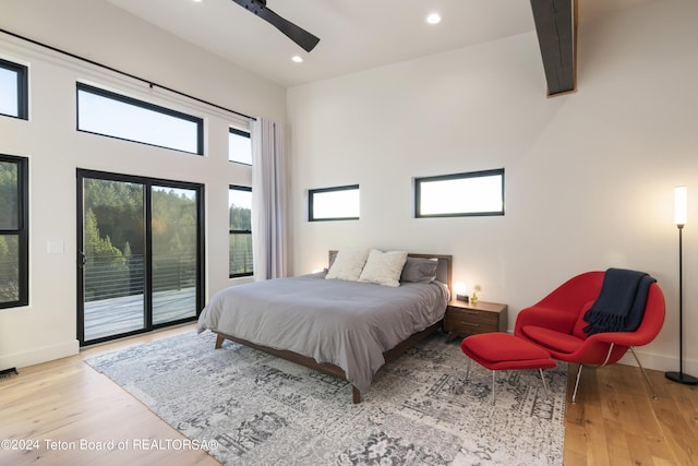 5170 Meandering Moose Dr, Victor, ID 83455 - bedroom with access to exterior, wood finished floors, recessed lighting, baseboards, and a ceiling fan