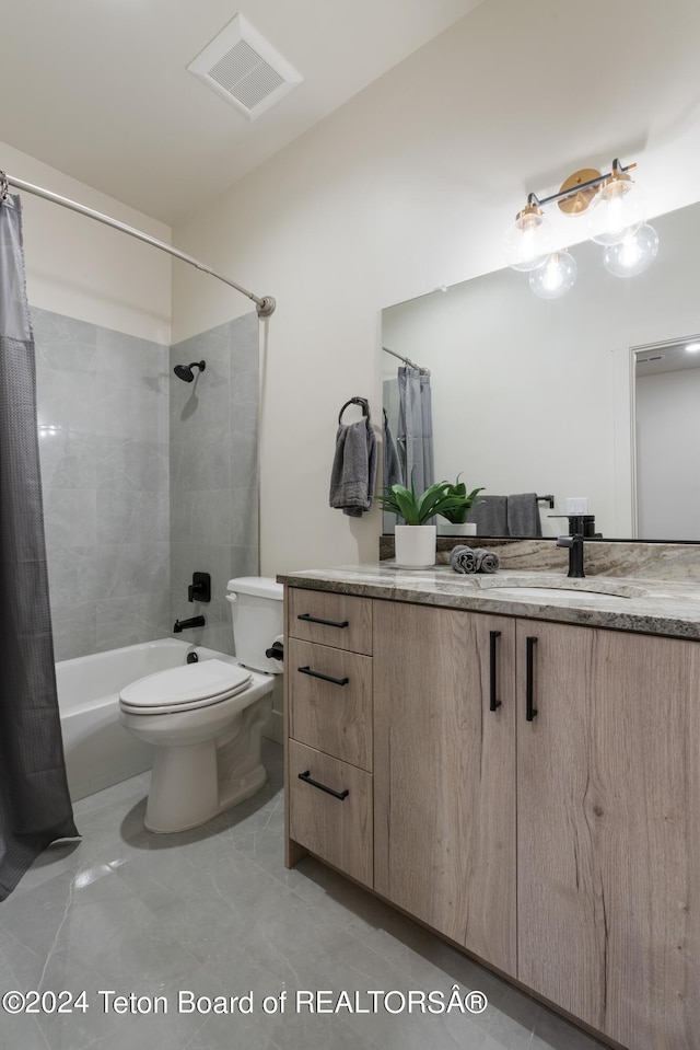 5170 Meandering Moose Dr, Victor, ID 83455 - bathroom with shower / bath combo with shower curtain, vanity, and toilet