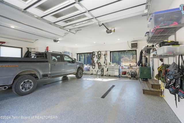 5170 Meandering Moose Dr, Victor, ID 83455 - garage featuring a garage door opener