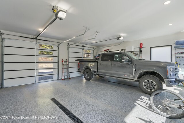 5170 Meandering Moose Dr, Victor, ID 83455 - garage with a garage door opener