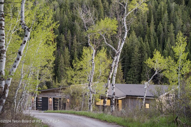5170 Meandering Moose Dr, Victor, ID 83455 - view of subject property with a forest