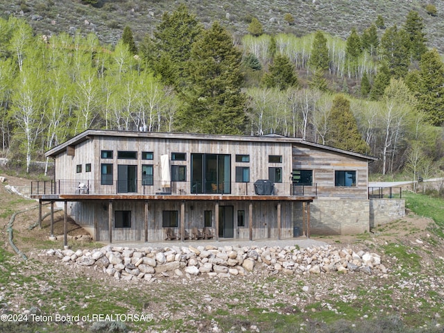 5170 Meandering Moose Dr, Victor, ID 83455 - back of house with a deck