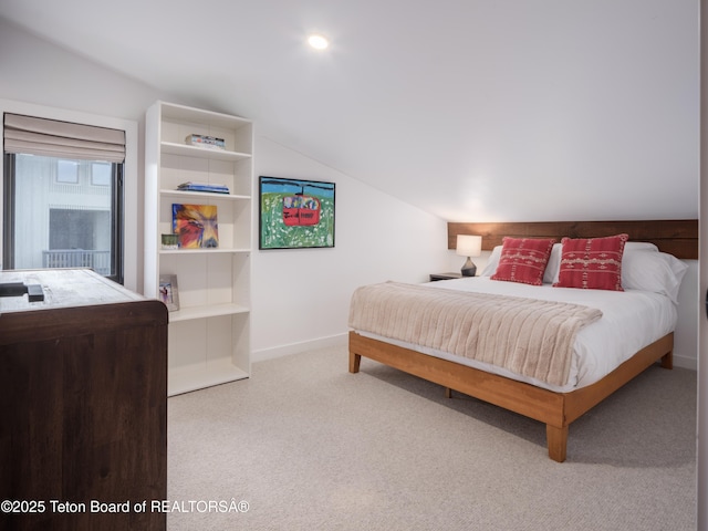 7280 N Rachel Way Unit B-7, Teton Village, WY 83025 - carpeted bedroom featuring vaulted ceiling and baseboards