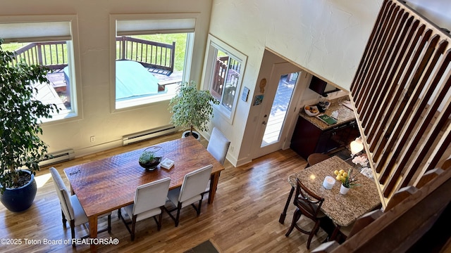 1890 Leigh Creek Ests, Tetonia, ID 83452 - foyer entrance with baseboard heating, wood finished floors, and healthy amount of natural light