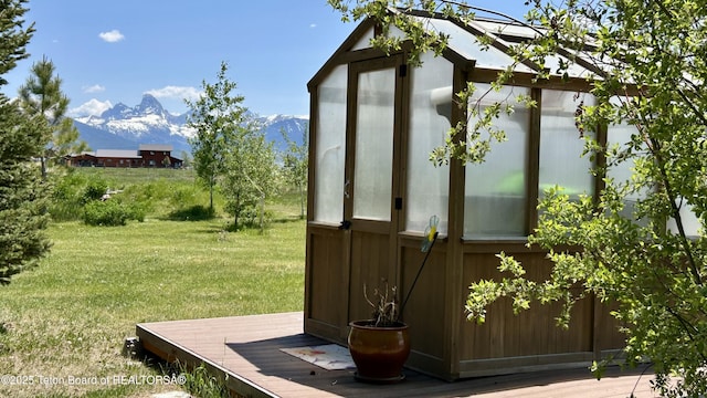 1890 Leigh Creek Ests, Tetonia, ID 83452 - view of greenhouse with a mountain view and a lawn