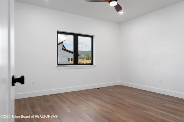 833 Booshway St, Driggs, ID 83422 - unfurnished room featuring wood finished floors, baseboards, ceiling fan, and recessed lighting