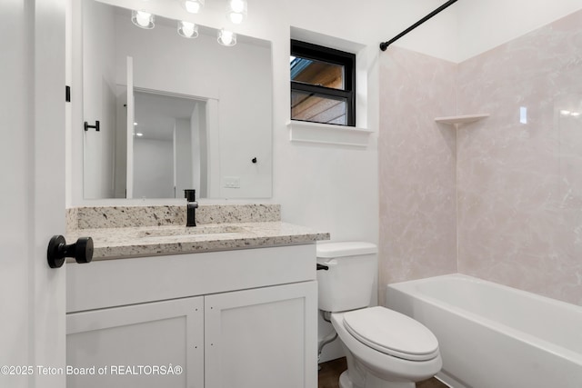 833 Booshway St, Driggs, ID 83422 - full bathroom featuring vanity, toilet, and shower / washtub combination