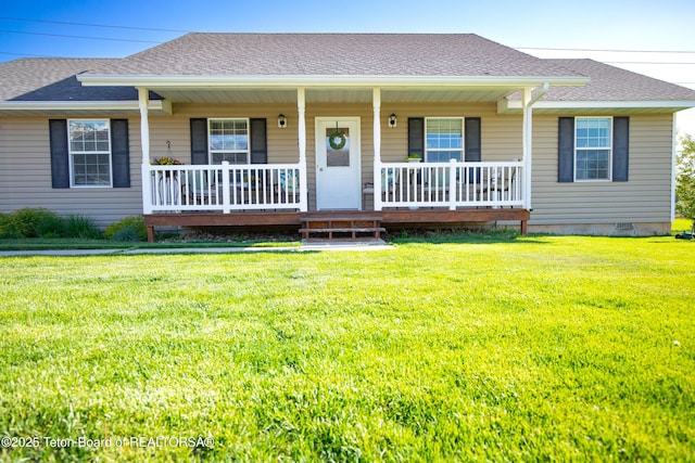 28 Brushwood Dr, Star Valley Ranch, WY 83127 - view of front of property featuring a porch, a front yard, and a shingled roof