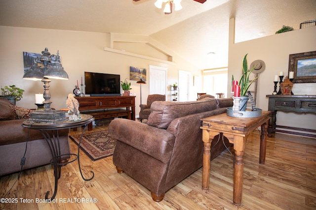 28 Brushwood Dr, Star Valley Ranch, WY 83127 - living room with light wood finished floors, a ceiling fan, and lofted ceiling