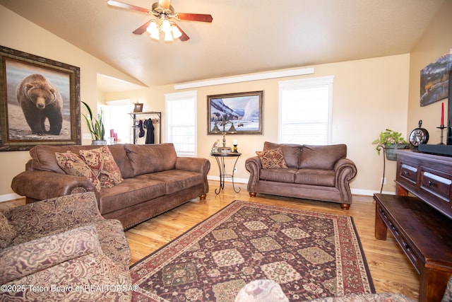 28 Brushwood Dr, Star Valley Ranch, WY 83127 - living area featuring vaulted ceiling, a ceiling fan, baseboards, and wood finished floors