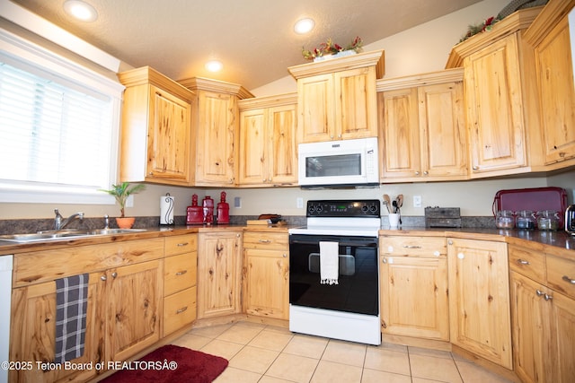 28 Brushwood Dr, Star Valley Ranch, WY 83127 - kitchen with white appliances, a sink, light brown cabinets, light tile patterned floors, and recessed lighting