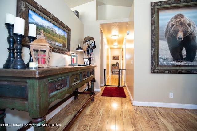 28 Brushwood Dr, Star Valley Ranch, WY 83127 - corridor featuring wood finished floors and baseboards