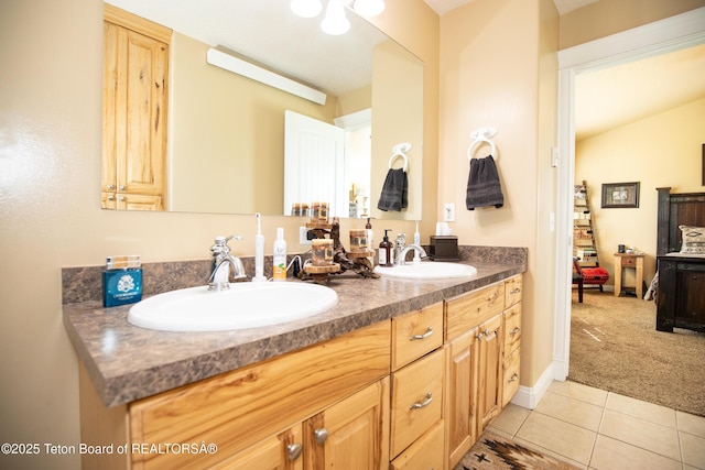 28 Brushwood Dr, Star Valley Ranch, WY 83127 - full bathroom with double vanity and tile patterned flooring