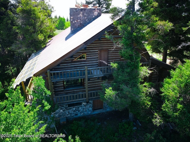 3392 Bainbridge Dr, Tetonia, ID 83452 - rear view of property with a chimney and a metal roof
