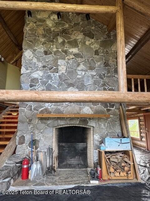 3392 Bainbridge Dr, Tetonia, ID 83452 - detailed view of a fireplace and a wood ceiling with exposed beams