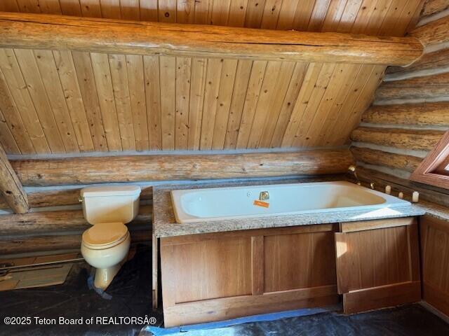 3392 Bainbridge Dr, Tetonia, ID 83452 - bathroom featuring a garden tub, rustic walls, and wood ceiling