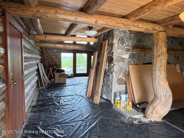 3392 Bainbridge Dr, Tetonia, ID 83452 - corridor with a wood ceiling with exposed beams and log walls