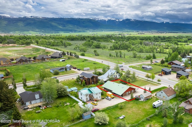 485 E Little Ave, Driggs, ID 83422 - aerial view of residential area featuring property parcel outlined and a mountainous background