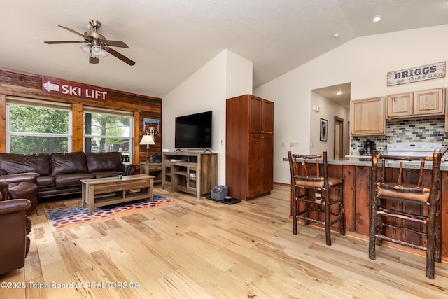 485 E Little Ave, Driggs, ID 83422 - living area with vaulted ceiling, light wood-style floors, and a ceiling fan