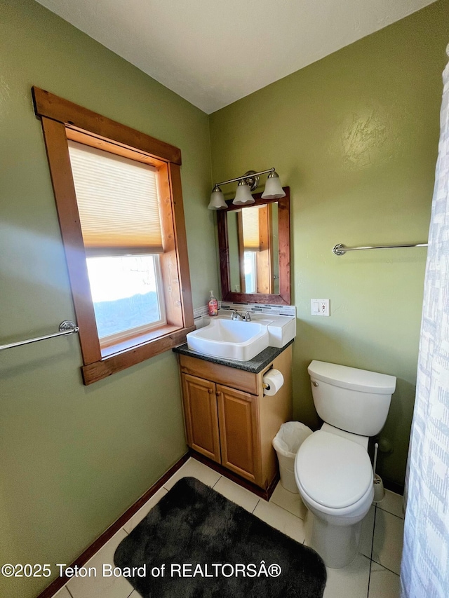 485 E Little Ave, Driggs, ID 83422 - half bath featuring vanity, toilet, and tile patterned flooring