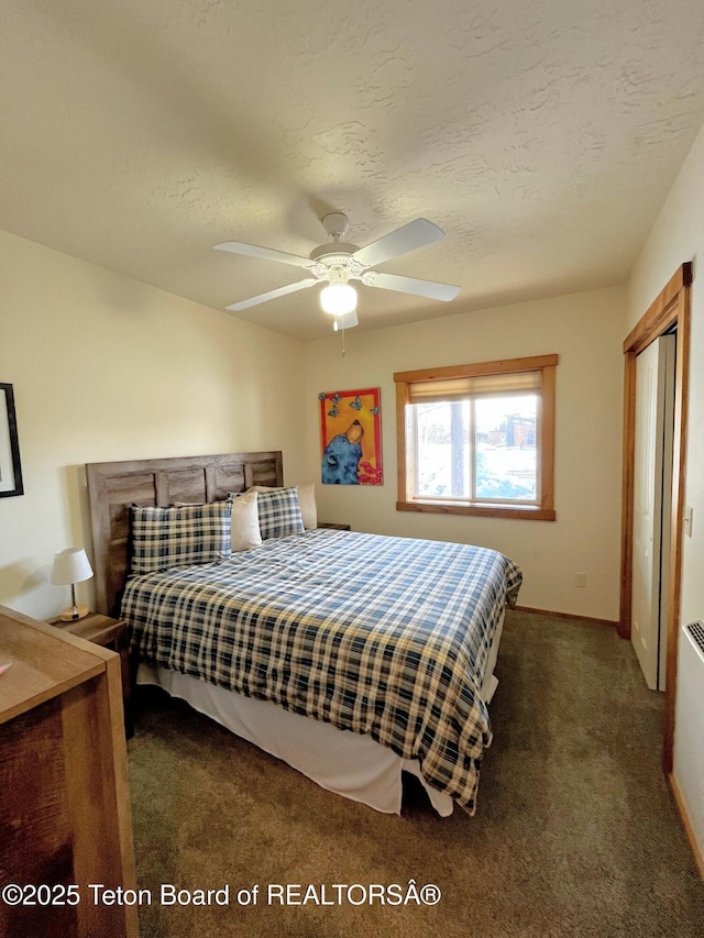 485 E Little Ave, Driggs, ID 83422 - carpeted bedroom featuring baseboards, a ceiling fan, and a textured ceiling