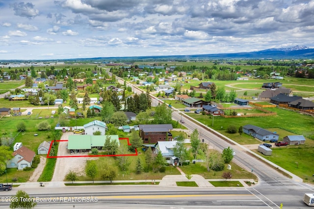 485 E Little Ave, Driggs, ID 83422 - aerial perspective of suburban area with property boundaries highlighted and mountains