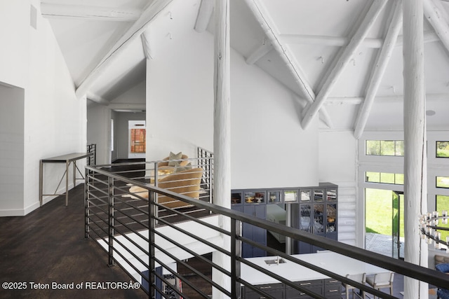 185 S Swan Rd, Jackson, WY 83001 - stairs featuring high vaulted ceiling and beamed ceiling