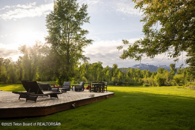 185 S Swan Rd, Jackson, WY 83001 - view of green lawn featuring a wooden deck