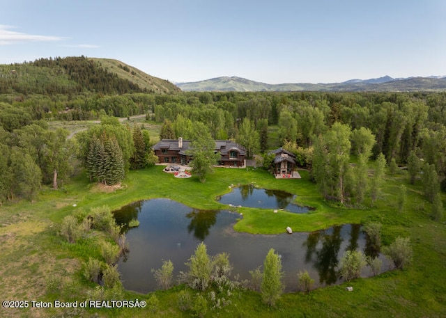 185 S Swan Rd, Jackson, WY 83001 - aerial view of property and surrounding area with a forest and a water and mountain view