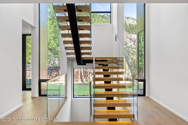 80 Rancher St, Jackson, WY 83001 - stairs featuring wood finished floors and plenty of natural light