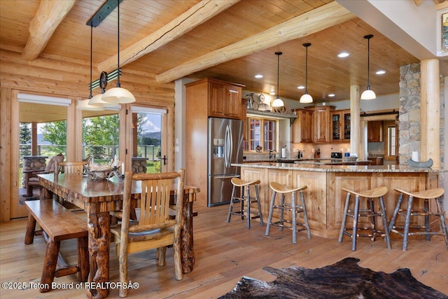 2321 S 3500 W, Driggs, ID 83422 - dining room featuring a wooden ceiling with exposed beams, light wood-style flooring, and recessed lighting