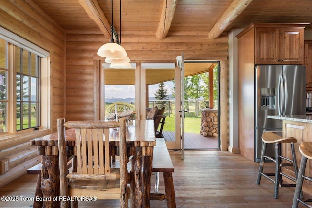 2321 S 3500 W, Driggs, ID 83422 - dining space featuring a wood ceiling with exposed beams and hardwood / wood-style flooring