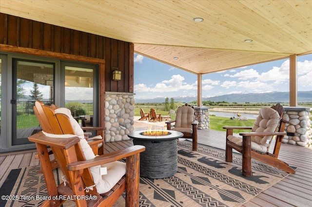 2321 S 3500 W, Driggs, ID 83422 - deck featuring a fire pit and a water and mountain view
