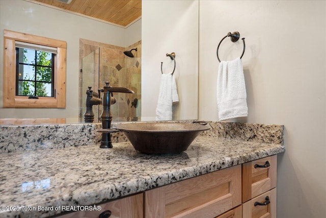 2321 S 3500 W, Driggs, ID 83422 - full bath featuring vanity, tiled shower, and wooden ceiling