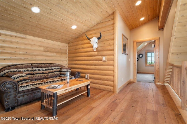 2321 S 3500 W, Driggs, ID 83422 - living room with lofted ceiling, light wood-type flooring, wood ceiling, recessed lighting, and rustic walls