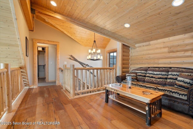 2321 S 3500 W, Driggs, ID 83422 - living room featuring wood ceiling, rustic walls, wood-type flooring, a chandelier, and recessed lighting
