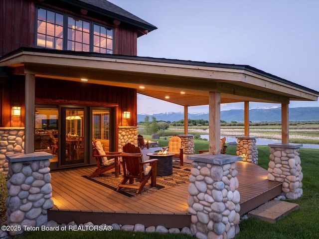 2321 S 3500 W, Driggs, ID 83422 - wooden deck with a water view and a fire pit
