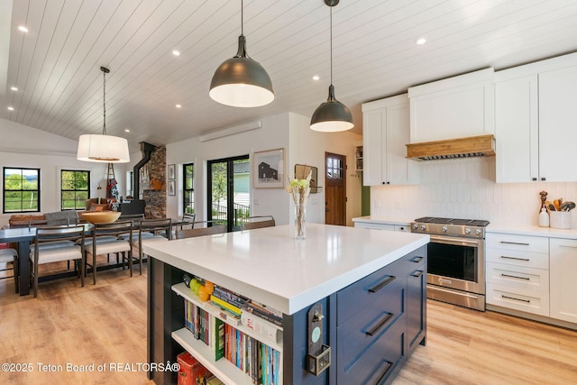 4326 State Line Rd, Freedom, WY 83120 - kitchen featuring gas range, open shelves, light countertops, white cabinets, and recessed lighting
