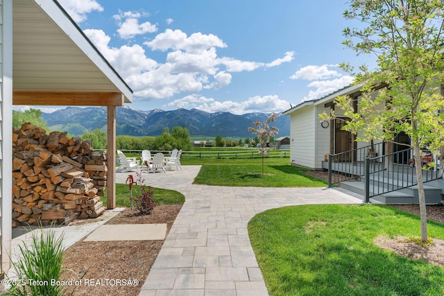 4326 State Line Rd, Freedom, WY 83120 - view of yard with a mountain view and a patio area
