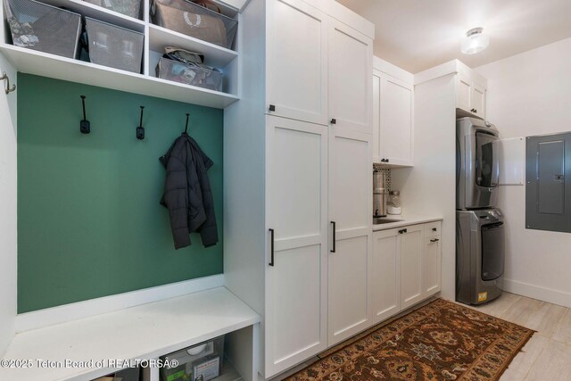 4326 State Line Rd, Freedom, WY 83120 - mudroom featuring estacked washer and dryer and electric panel