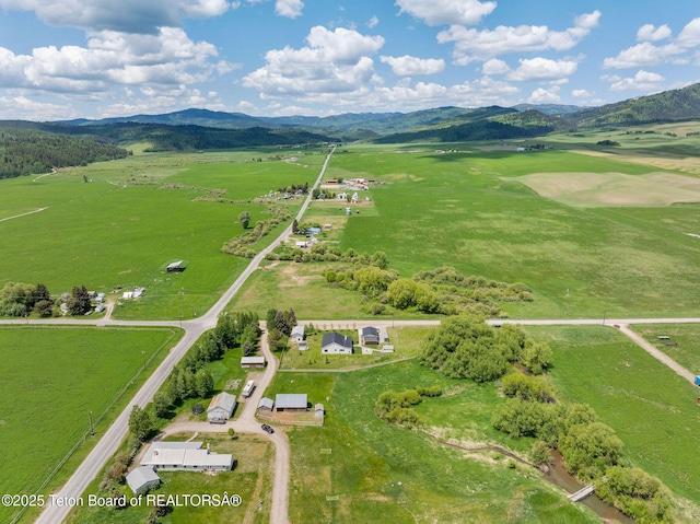4326 State Line Rd, Freedom, WY 83120 - aerial view of property and surrounding area with a mountainous background and rural landscape