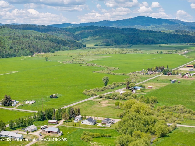 4326 State Line Rd, Freedom, WY 83120 - view of rural area with a mountainous background and a forest